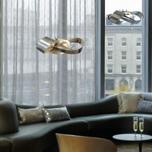 Load image into Gallery viewer, Flux LED Pendant Light in living room.
