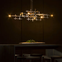 Load image into Gallery viewer, Grid Multi Light Pendant Light in dining room.
