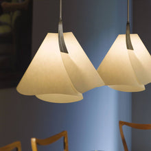 Load image into Gallery viewer, Mobius Pendant Light in dining room.
