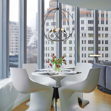 Load image into Gallery viewer, Orb Chandelier in dining room.
