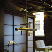Load image into Gallery viewer, Planar LED Pendant Light in dining room.
