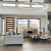 Load image into Gallery viewer, Ringo LED Pendant Light in living room.
