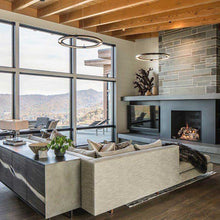 Load image into Gallery viewer, Ringo LED Pendant Light in living room.
