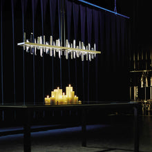 Load image into Gallery viewer, Solitude Linear LED Pendant Light in living room.
