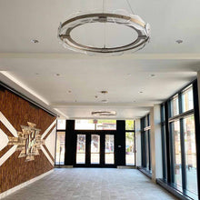Load image into Gallery viewer, Solstice Linear LED Pendant Light in living room.
