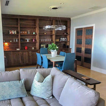 Load image into Gallery viewer, Solstice Linear LED Pendant Light in living room.
