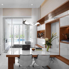 Load image into Gallery viewer, Zephyr LED Pendant Light in living room.
