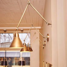 Load image into Gallery viewer, Arti Wall Light in living room.

