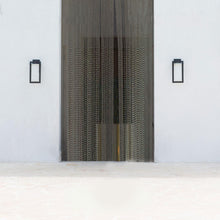 Load image into Gallery viewer, Colfax Outdoor Wall Light in Outside Area.
