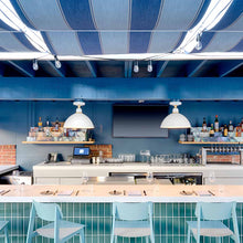 Load image into Gallery viewer, Foundry Outdoor Pendant Barn Light in restaurant.
