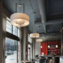 Load image into Gallery viewer, Hampton Drum Pendant Light in Restaurant.
