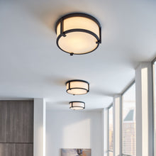 Load image into Gallery viewer, Lowell Flush Mount Ceiling Light in Living Room..
