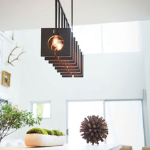 Load image into Gallery viewer, Ludlow Linear Pendant Light in living room.
