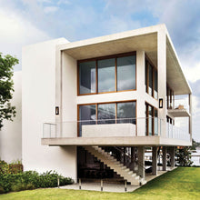 Load image into Gallery viewer, Luna Tall Outdoor Wall Light in Outside Area.
