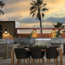 Load image into Gallery viewer, Mist Outdoor Wall Light in Outside Area.
