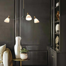 Load image into Gallery viewer, Sinclair Chandelier in living room.
