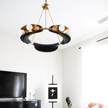Load image into Gallery viewer, Hopper Chandelier in living room.
