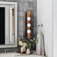 Load image into Gallery viewer, Hopper Wall Light in bathroom.
