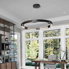 Load image into Gallery viewer, Aura LED Pendant Light in living room.
