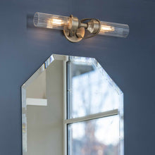 Load image into Gallery viewer, Bow Bath Wall Light in bathroom.
