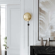 Load image into Gallery viewer, Afton Plug-In Wall Light in living room.
