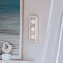Load image into Gallery viewer, Budnick LED Bath Vanity Light in living room.
