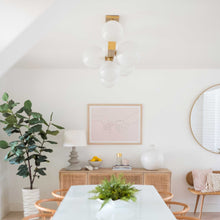 Load image into Gallery viewer, Hinsdale Linear Pendant Light in living room.
