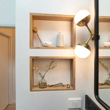 Load image into Gallery viewer, Saratoga LED Wall Light in bathroom.
