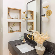 Load image into Gallery viewer, Saratoga LED Wall Light in bathroom.
