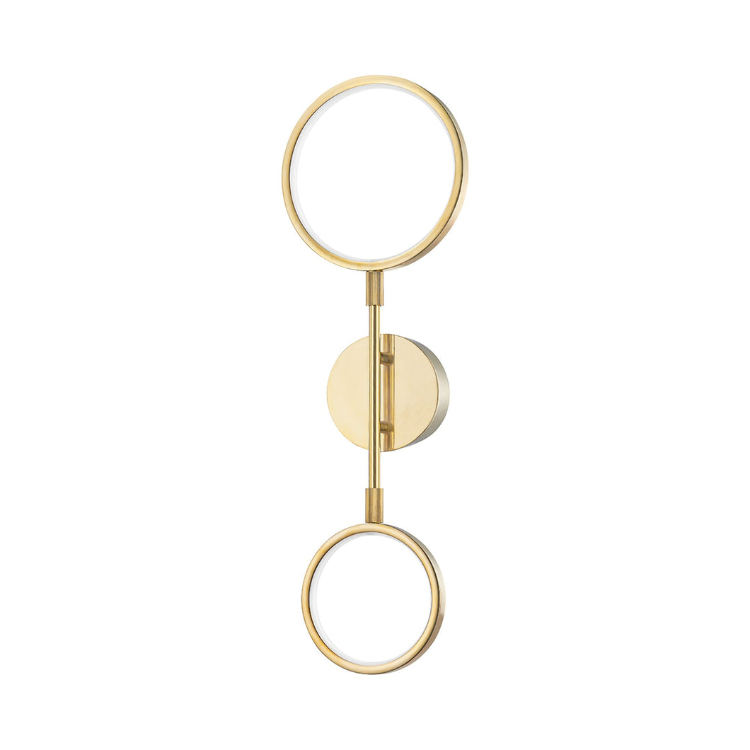 Saturn LED Wall Light in Aged Brass.