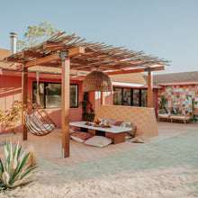 Load image into Gallery viewer, Huxley Pendant Light in Outdoor Area.
