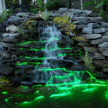 Load image into Gallery viewer, InvisiLED Outdoor RGB Color Changing 24V LED Tape Light in outside area.
