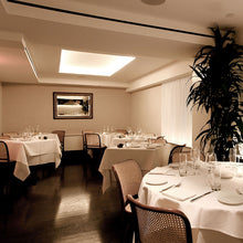Load image into Gallery viewer, InvisiLED PRO 2 24V LED Tape Light in dining room.
