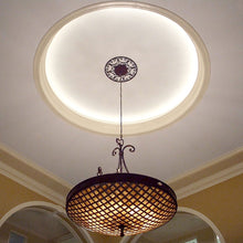 Load image into Gallery viewer, InvisiLED PRO 24V LED Tape Light in living room.
