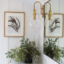 Load image into Gallery viewer, Ivy LED Wall Light in bathroom.
