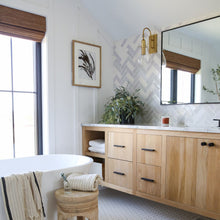 Load image into Gallery viewer, Ivy LED Wall Light in bathroom.
