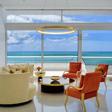 Load image into Gallery viewer, Jasmine LED Pendant Light in living room.
