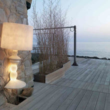 Load image into Gallery viewer, Alibabig LED Floor Lamp in Outside Area.
