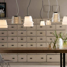 Load image into Gallery viewer, Bibendum LED Pendant Light in living room.
