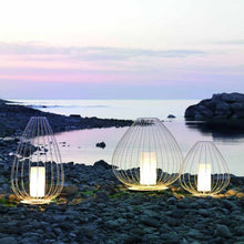 Load image into Gallery viewer, Cell Outdoor LED Floor Lamp in outside area.
