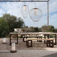 Load image into Gallery viewer, Cell Outdoor LED Floor Lamp in outside area.
