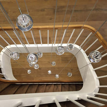 Load image into Gallery viewer, Dew LED Chandelier in stairs.
