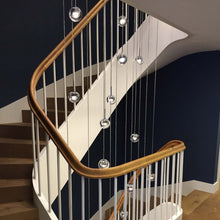 Load image into Gallery viewer, Dew LED Multi Light Pendant Light in stairs.
