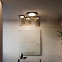 Load image into Gallery viewer, Giass LED Semi Flush Mount Ceiling Light in living room.

