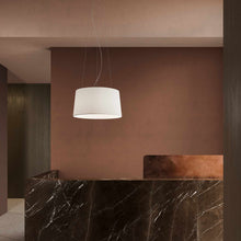 Load image into Gallery viewer, Tripod Pendant Light in living room.
