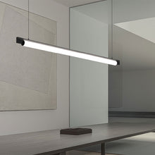 Load image into Gallery viewer, Keel™ LED Linear Pendant Light in living room.
