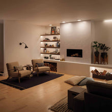 Load image into Gallery viewer, Ellerbeck Wall Light in living room.
