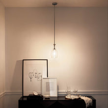 Load image into Gallery viewer, Everly Hourglass Pendant Light in livingroom.

