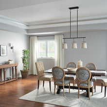Load image into Gallery viewer, Marika Linear Pendant Light in dining room.
