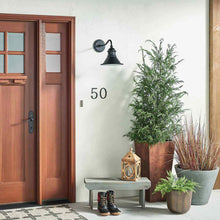 Load image into Gallery viewer, Northland Wall Light in Outside Area.
